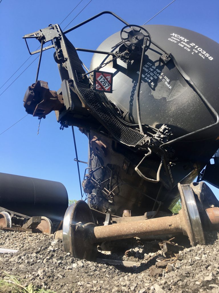 Railcar rollover spill