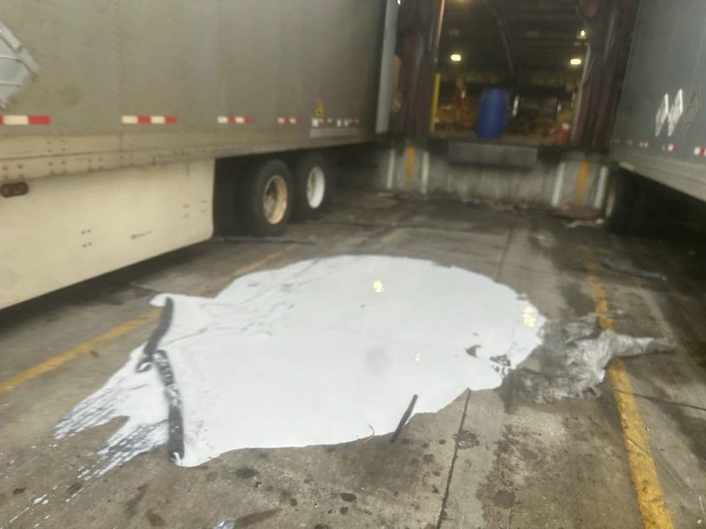 Liquid Adhesive Spill at dock in trailer