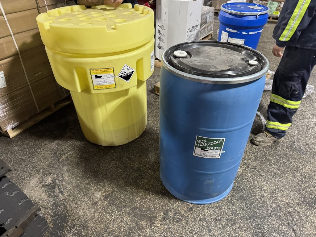 two waste drums, sealed and labled after HAZMAT Cleaning Services